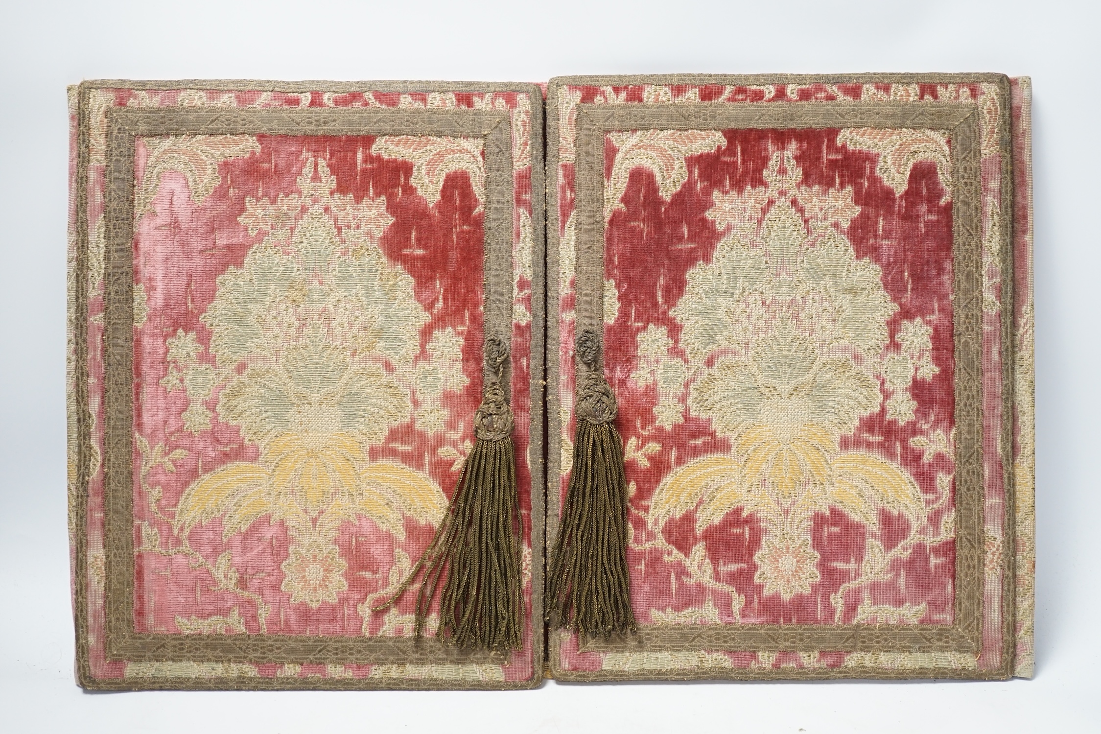 An 18th century style embroidered writing pad in damask and velvet, 32 x 51cm. Condition - poor to fair, generally faded